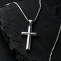Polished stainless steel cross pendant on box chain